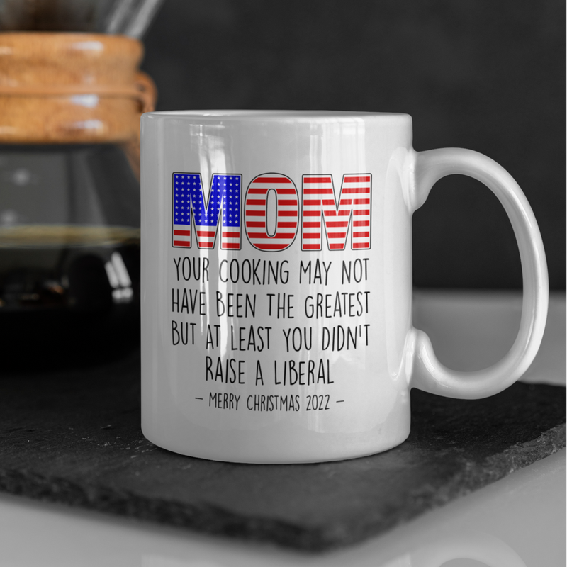 Mom Atleast You Didn't Raise A Liberal Funny Xmas Mug